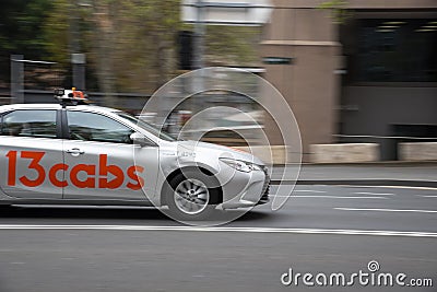 13cabs is a taxi network service provider NSP operating in Sydney, The image was taken in panning shot. Editorial Stock Photo